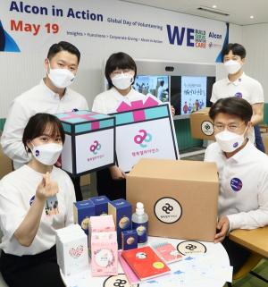행복얼라이언스-한국알콘, 결식우려아동 위한 기초 생필품 패키지 자원봉사